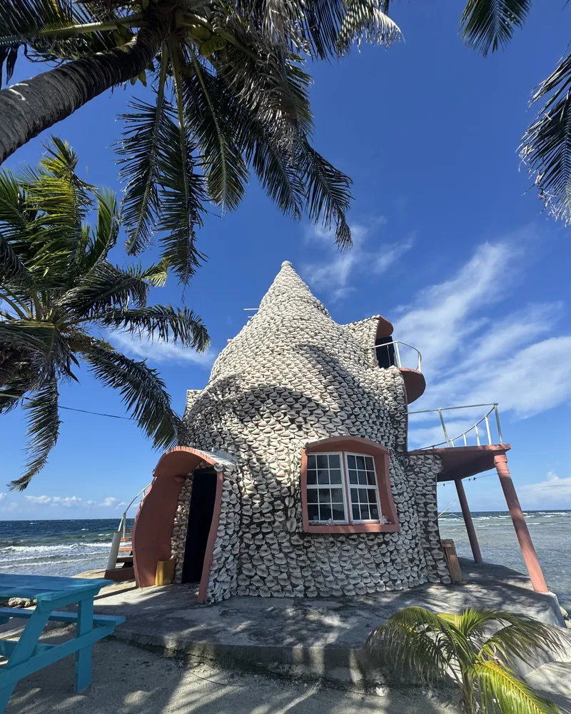 The Conch Shell House on Tom Owens Caye, its walls covered in conch shells